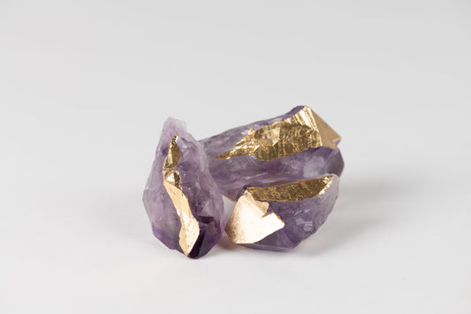 A photo of a set of gold accent amethyst crystals